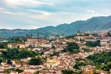 Fototapeta na wymiar View of the historic city of Ouro Preto in Minas Gerais with its colonial-style houses and churches and the mountains in the background