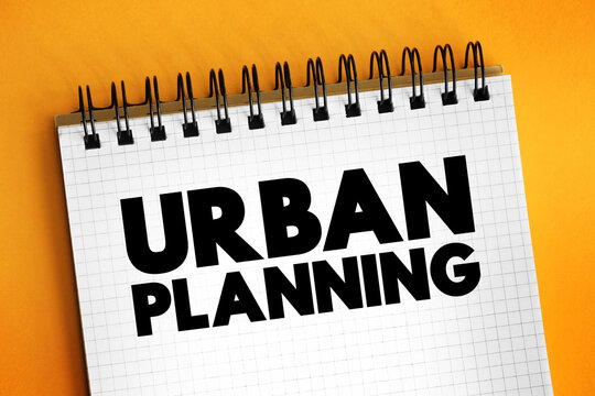 Urban planning - process that is focused on the development and design of land use and the built environment, text concept on notepad