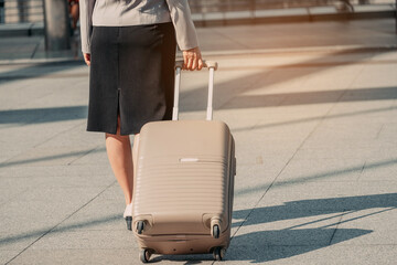 Fototapeta na wymiar Asian woman walking with a luggage.