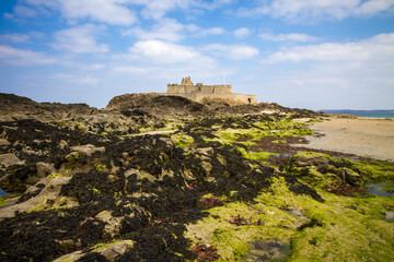 Fototapeta na wymiar Fort National, beach and sea in Saint-Malo city, Brittany, France