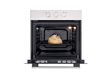 Black oven with silver control panel, three round control knobs. Open door and baked bread inside, lights on inside. Front view. Isolate on white