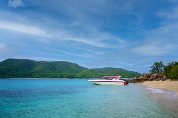 The speedboat is waiting for tourists to return in the evening.
