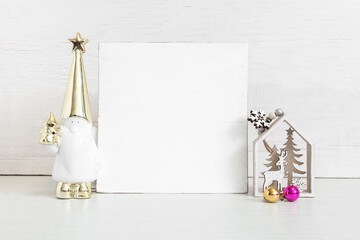 Square wooden sign mockup with christmas attributes.