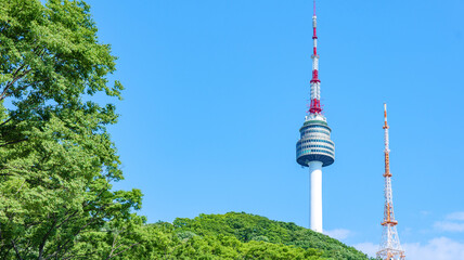 Namsan Seoul Tower, a landmark in Seoul, South Korea photographed against a clear sky during the...