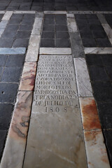 Evora, Portugal – April 03, 2022: Chapel of Bones, Tombstone in the pavement, Evora, Alentejo, Portugal