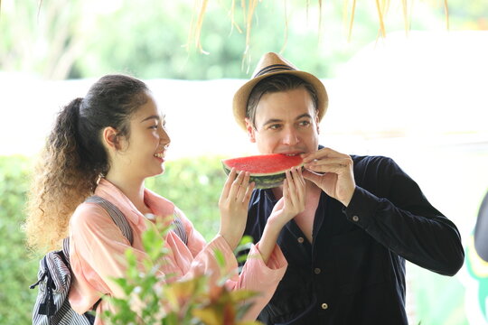 couple love tourist happy eating melon