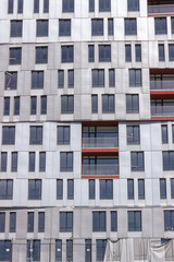 Fototapeta na wymiar unfinished modern building has many windows