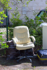 white office chair standing outside