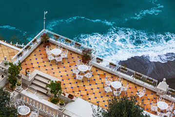 Empty open-air restaurant at Amalfi seacoast, Italy