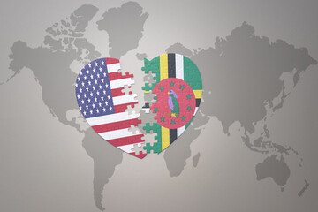 puzzle heart with the national flag of united states of america and dominica on a world map background. Concept.