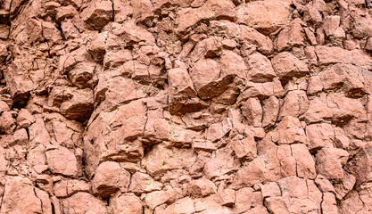 Mountain cracked earth wall background. texture, nature