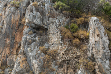 Naklejka premium The Ancient Ruins of Olympos - old abandoned city in Turkey near the village of Cirali
