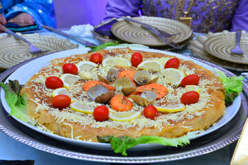 Bastila or `Pastilla` is a traditional moroccan dish. fish Bastila is a pie filled with fish's ,...