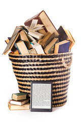 e-book against paper books, e-book next to a trash can with books.