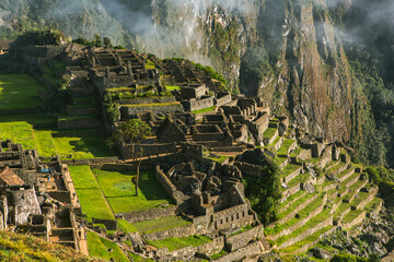 Wonder of the World Machu Picchu in Peru. Beautiful landscape in Andes Mountains with Incan sacred...