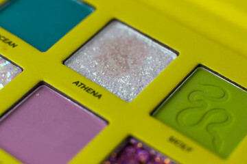 Eye shadow close-up. Professional bright pigments for makeup. Makeup Artist Cosmetics