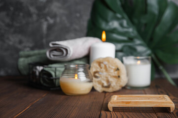 Stand podium for products. Natural bathroom background. Zero waste in life. Relaxation spa concept, candles, beauty..