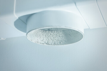 Plastic air duct in the dust.