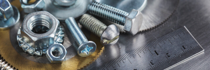 set of different nuts, bolts, screws, washers and drill bits,thread tap and mill cutters on steel...