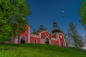 Sunset near old buildings in Banska Stiavnica town in spring evening