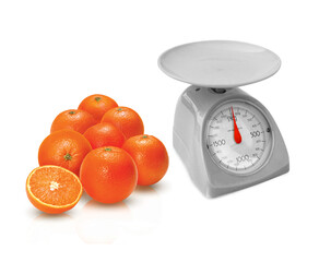 Weighing Instrument and oranges.