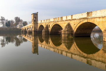 Naklejka premium edirne - turkey. 7 december.2019 Edirne, eastern Thrace, a bridge over the River Tunca during the Ottoman Empire in Turkey. tunca bridge