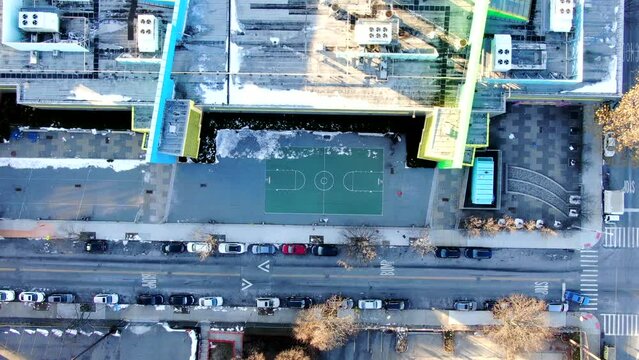 Descending God View Shot of a Basketball Court at Bathgate High School in the Bronx