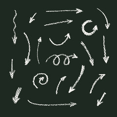 Vector hand drawn chalk arrows icons set on the blackboard.