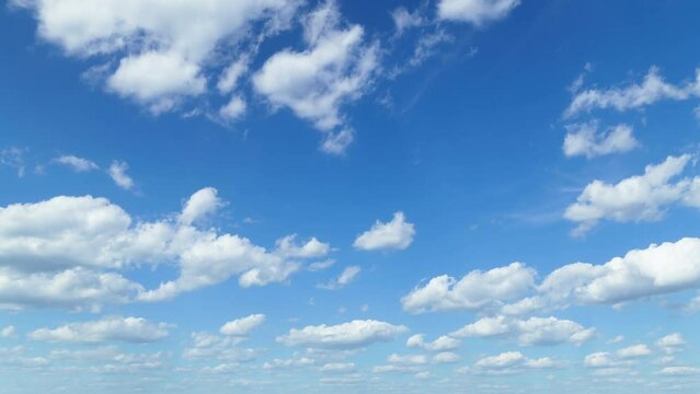 timelapse of beautiful blue sky with clouds on bright sunny day for abstract background
