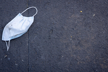 New post-pandemic garbage. Face masks thrown in the streets after the end of the restrictions.