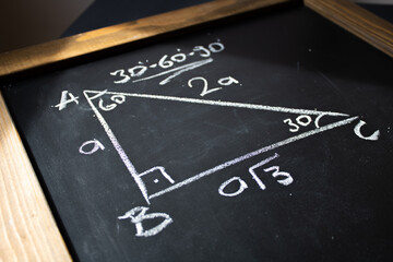 Fototapeta na wymiar The geometric formula on a blackboard