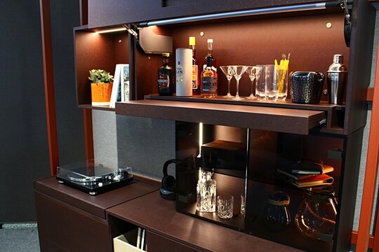 Opened modern bar for wine and alcohol drings made by Blum company, instaled in booth on Furniture and Living Expo in Nitra, Slovakia