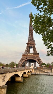 The Eifel Tower in the evening is a good screensaver for advertising a trip to Paris. High quality photo