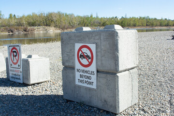 Cement Block Barriers at River Park Parking Lot