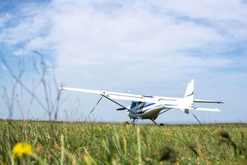 Small airplane on the grass