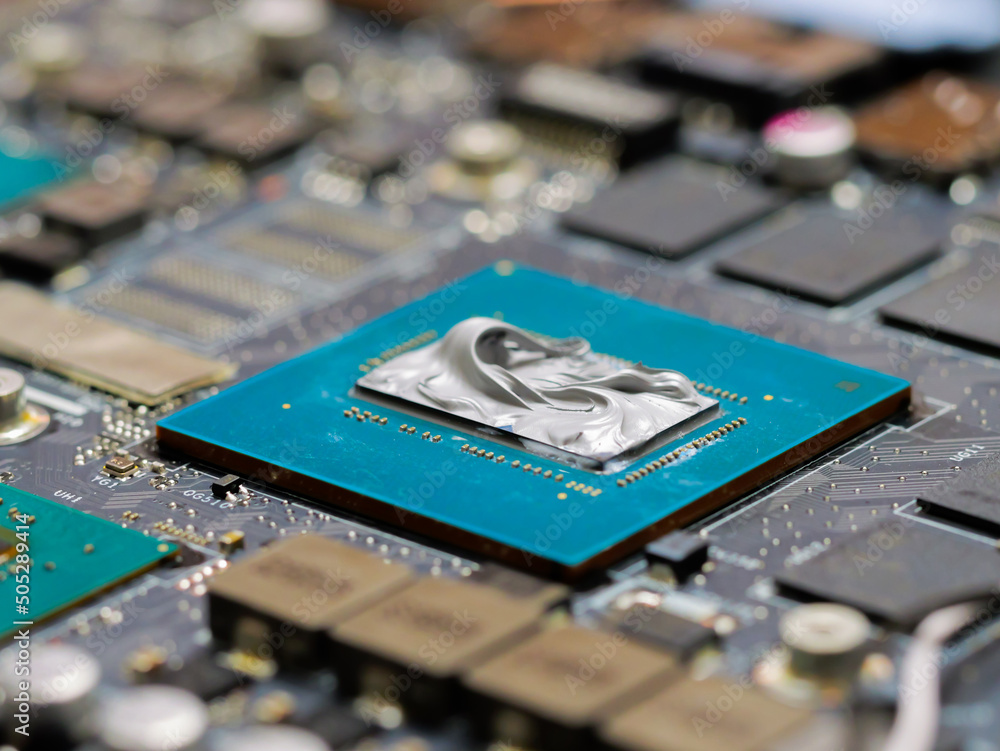 Aufkleber graphics processor, gpu on the motherboard of a laptop computer, with thermal paste applied in the c