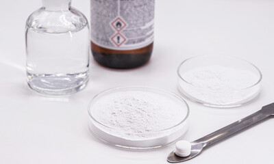 acetylsalicylic acid powder being produced in the laboratory, inside a petri dish, medicine...
