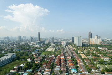 Aerial view of the roof of a house with a car taken by a drone, top view of road