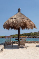 beach with umbrellas in quintana roo
