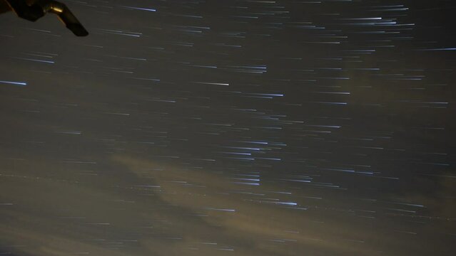 
Startrail timelapse on the Orion constellation under a light polluted sky