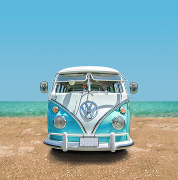 Vintage 1966 Volkswagen Bus at the beach, front view.