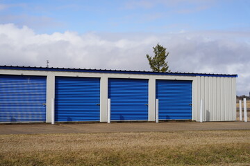 Fototapeta na wymiar Blue door storage units being used by the community