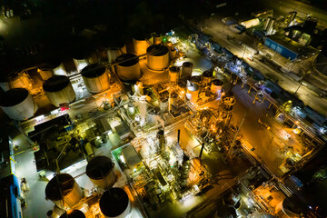Industrial oil and gas manufacturing refinery factory at night, petrol crude and petrochemical...