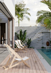 Modern private pool villa terrace with beach chairs, swimming pool and tropical outdoor plants.
