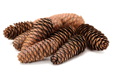 Pile of pine nuts on white background.