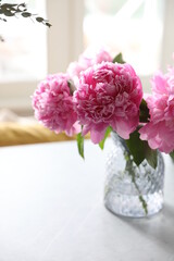 Bouquet of peonies at home in a vase
