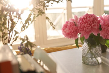 Bouquet of peonies at home in a vase