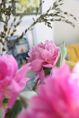 Bouquet of peonies at home in a vase