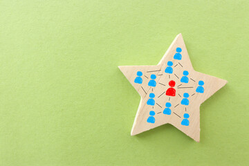 forming a successful team, people icons over wooden star, human resources, and management concept