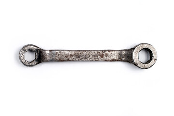 Old ring wrench on a white background.